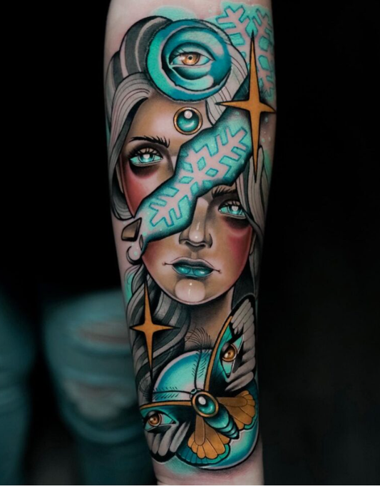 A man's arm showing a tattoo.
