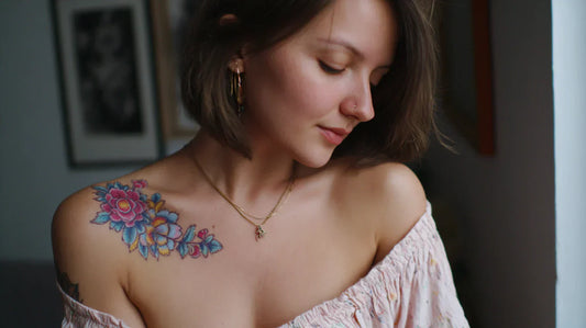 A girl showing her embroidery tattoo on her shoulder